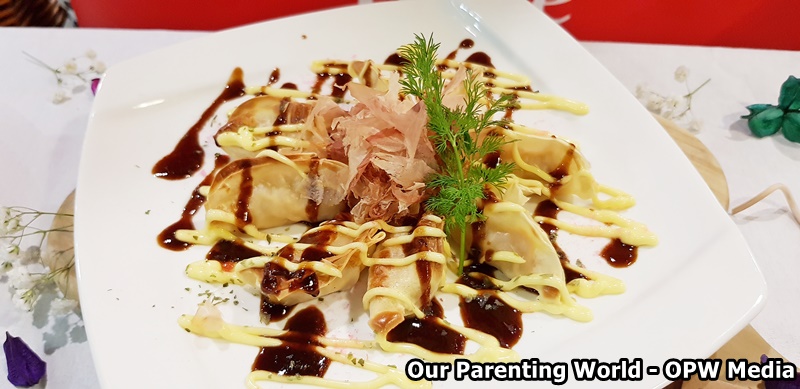 grilled gyoza with bonito flakes using cp pork and chicken gyoza